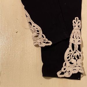 Back zenana leggings with white crocheted accent sides at ankles